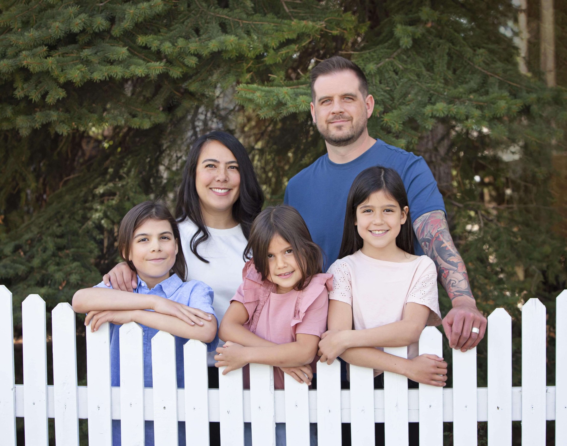 Brad Hefflick and Nydia Hefflick, owners of Dashing Dishes stand with
their three kids